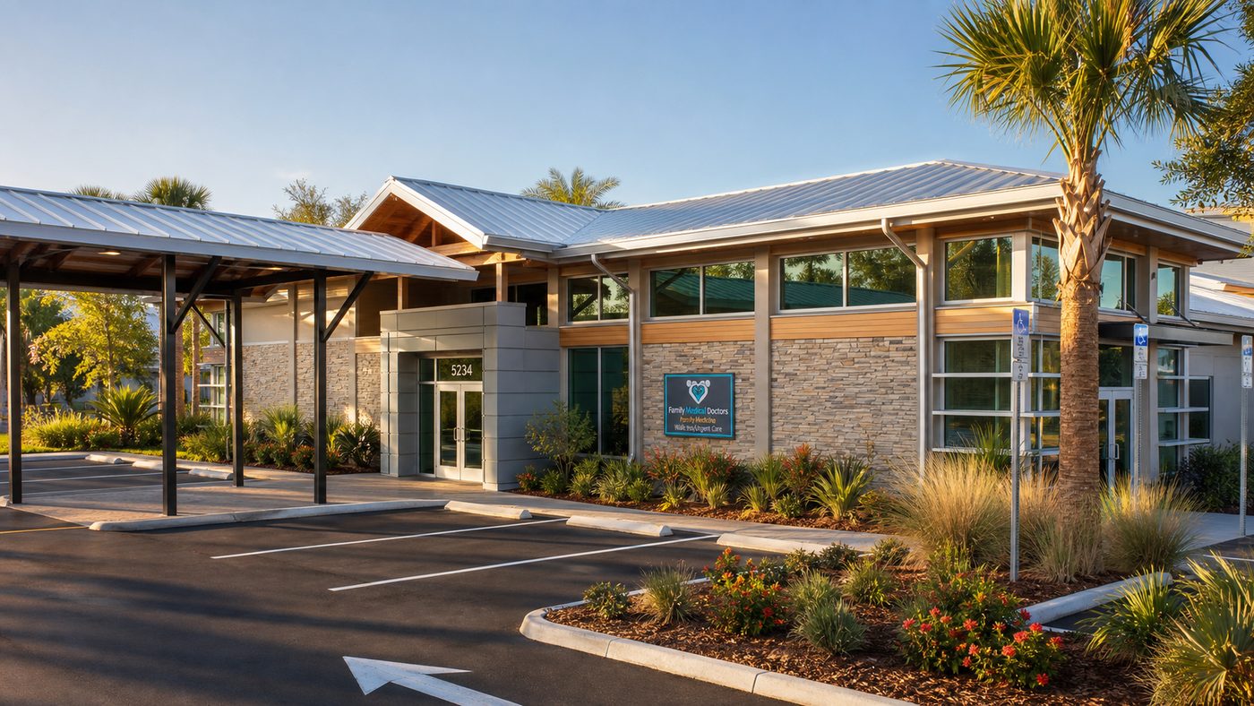 Front entrance of the Family Medical Doctors office on Little Road with covered drop-off and landscaping