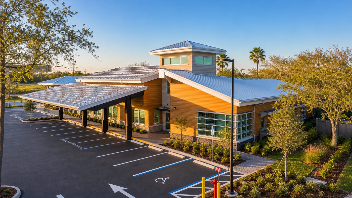 Side and rear view of the Family Medical Doctors building showing wood-accent exterior and covered parking